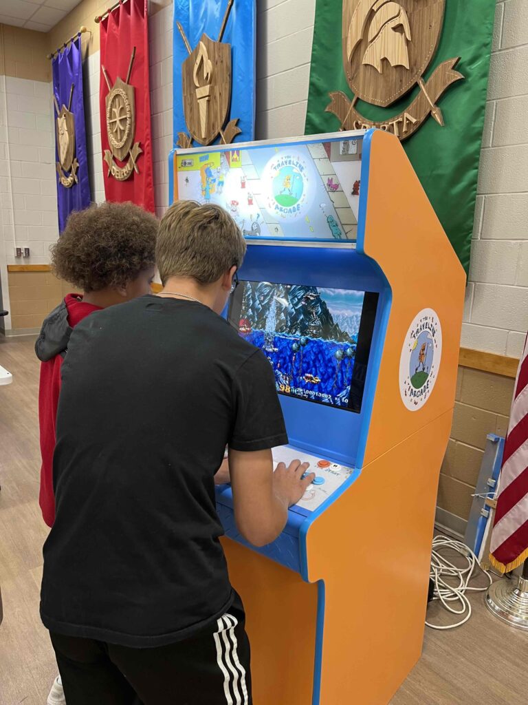 Two students play In the Hunt